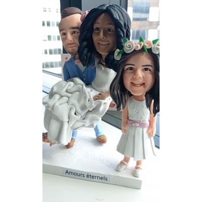 "Custom bobblehead wedding with our daughter"