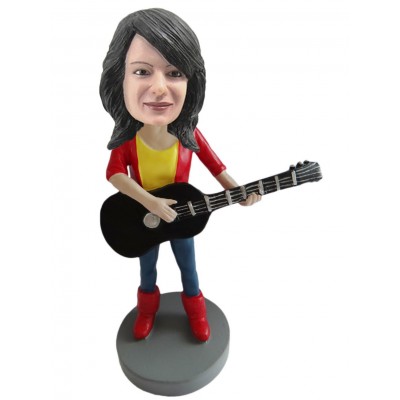 Figurine "Je joue de la guitare"