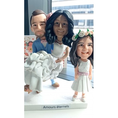 "Custom bobblehead wedding with our daughter"